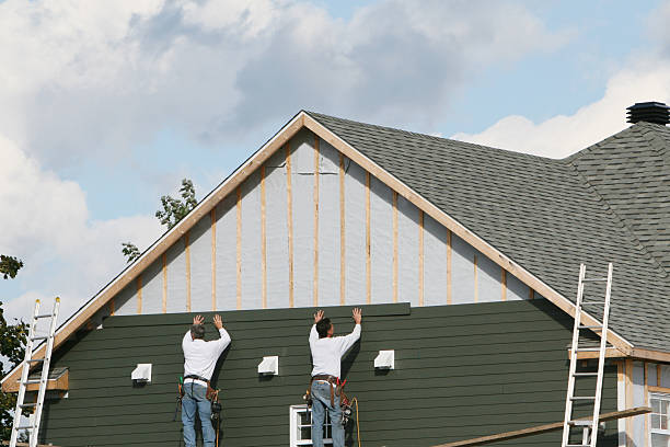 Professional Siding Replacement technician working in Braintree, MA